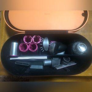 Dyson Case with attachments.